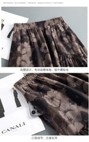 Women Floral Print Tiered Midi Skirt Elastic High Waist Pocketed Ruffle Hem Casual Boho Long Skirt