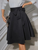 Women's Elegant High Waist Flared Midi Skirt with Bow Belt, Inclusive Fit, Stretch Knit Fabric, Versatile for Office and Party W