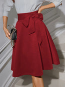 Women's Elegant High Waist Flared Midi Skirt with Bow Belt, Inclusive Fit, Stretch Knit Fabric, Versatile for Office and Party W